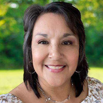 Herminia Garcia, TWRI (clickable, links to Herminia Garcia's biography page)