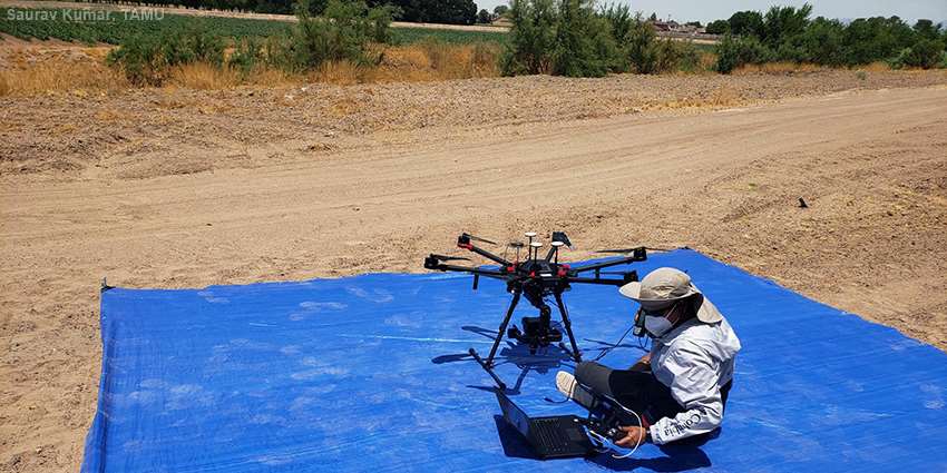 Saurav Kumar, Ph.D., flying a drone
