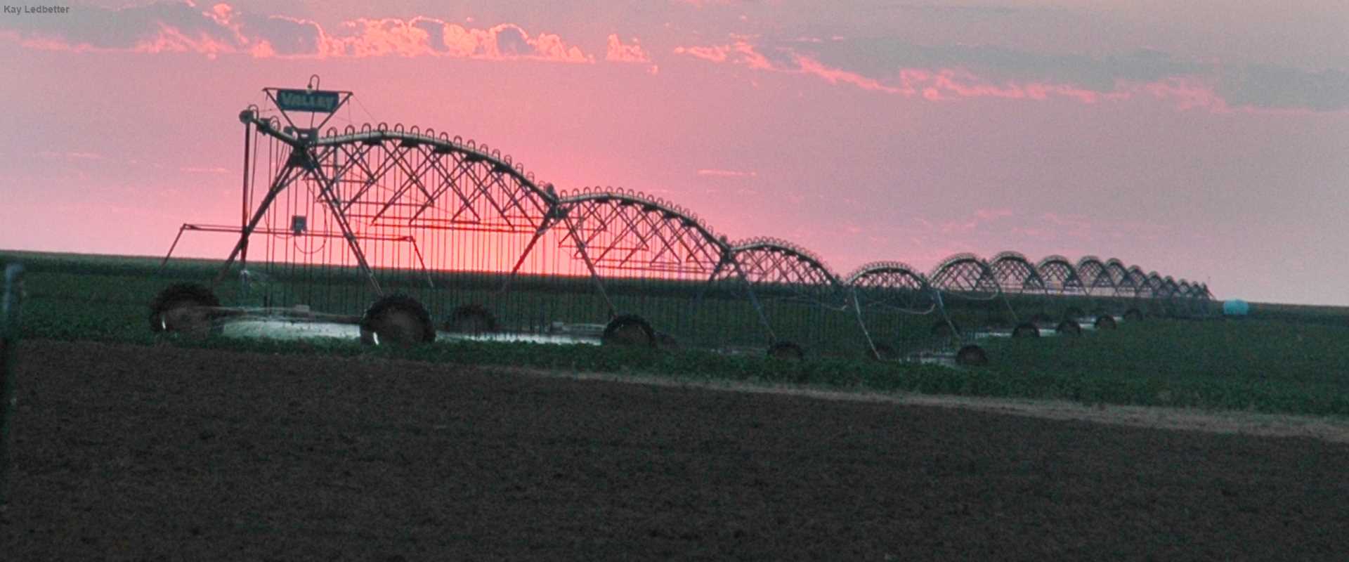 Center pivot at sunset by Kay Ledbetter