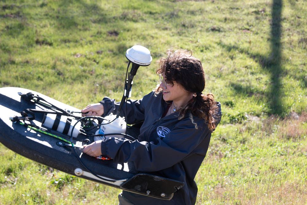 Jester was all smiles while calibrating the m9 Doppler boat to collect flow data by Sadie Kammlah, TWRI